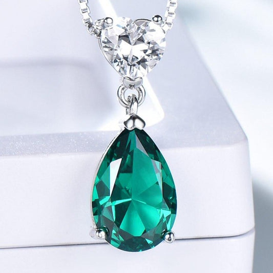 The Emerald Flame Necklace - the jewellery house