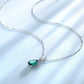 The Emerald Flame Necklace - the jewellery house