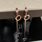 Roman hanging black steel earrings 