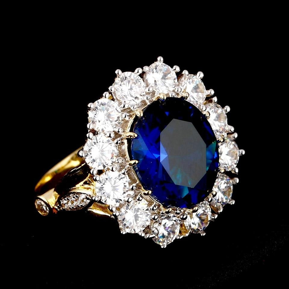 Romantic Luxury Golden Color With Big Oval Sapphire Ring With Diamonds - The Jewellery House