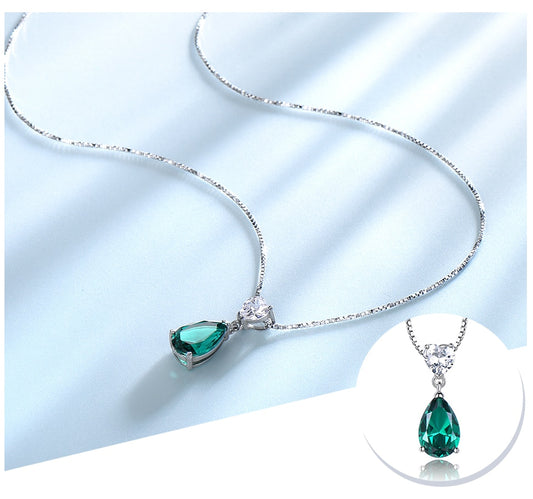 The Emerald Flame Necklace - the jewellery house